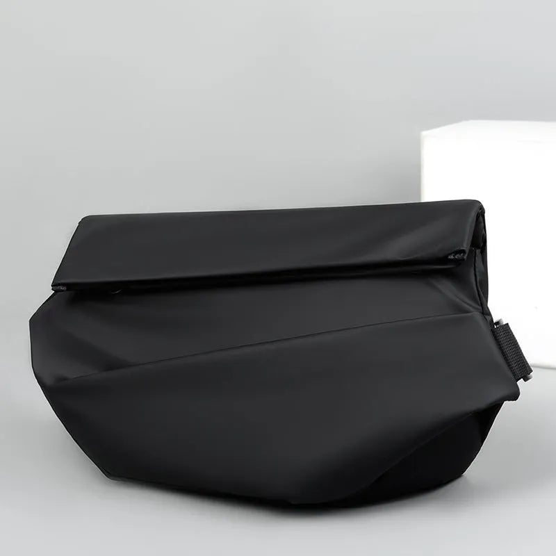 Grey medium crossbody bag with zip opening and shoulder strap