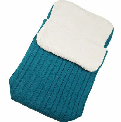 Envelope-style baby stroller sleeping bag in beige colour showing thick cotton wool filling and soft lining.