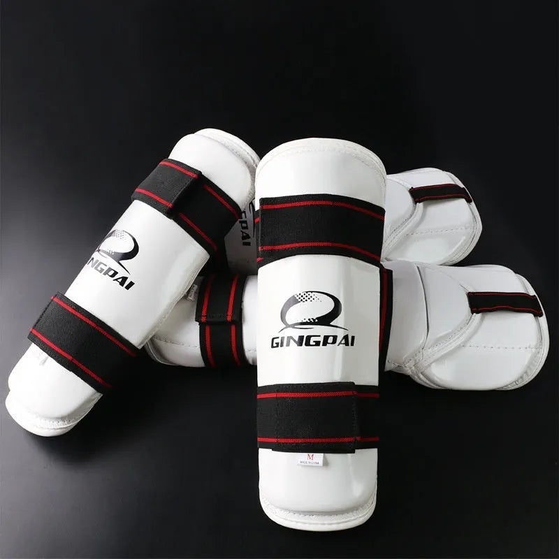 Taekwondo protective gear set showing PU EVA foam arm bands and leggings in sizes S M L XL.