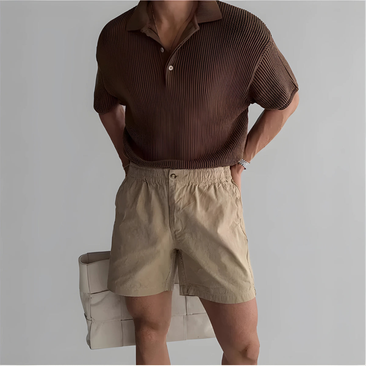 Cotton loose fit sports shorts in black, shown on a model for summer activewear.