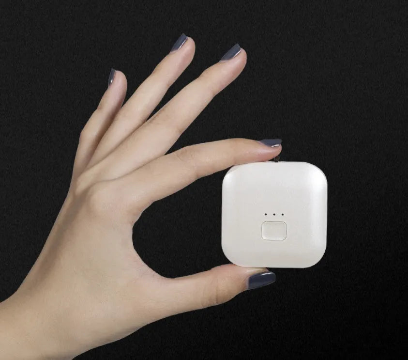 USB rechargeable wearable air purifier necklace in blue colour showing compact dimensions