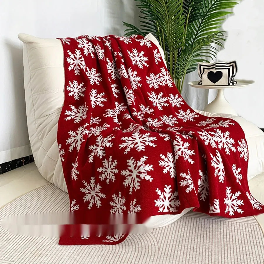 Christmas patterned acrylic blanket in snowflake or reindeer design showing casual style for home decoration