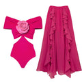 Colour-matching one-piece swimsuit and skirt set made from blue polyester fabric.