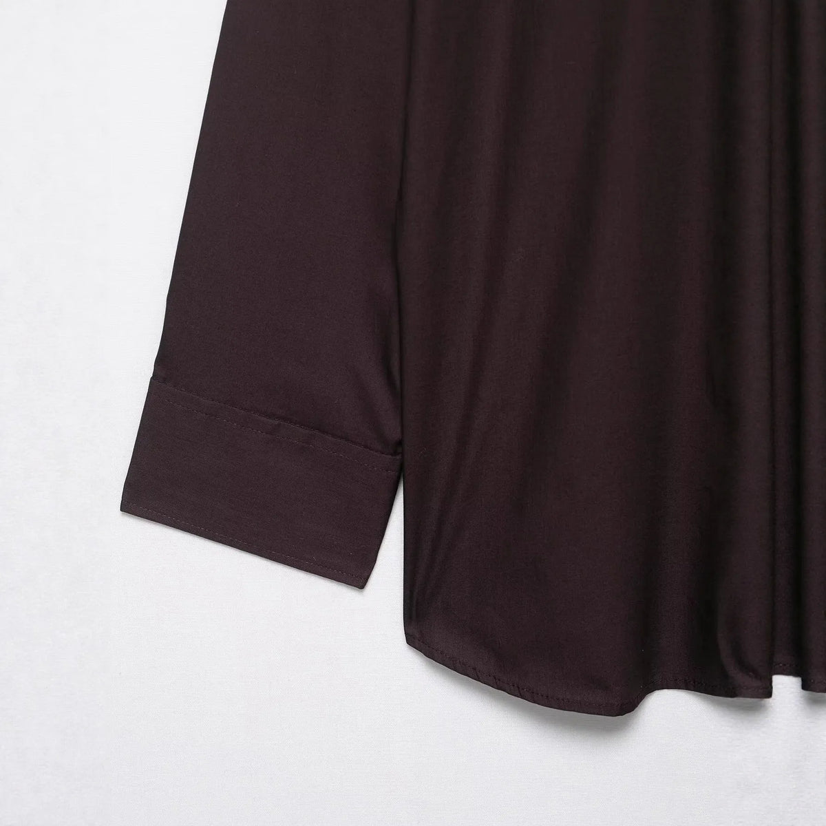 Brown women's shirt with long sleeves and bow tie collar in polyester poplin fabric