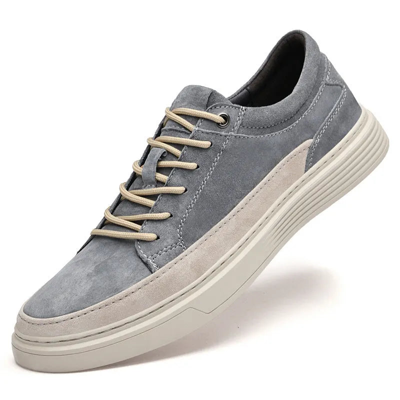 Men's grey casual leather skate shoes with round toe design and rubber sole