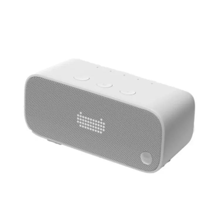 Elf Sugar Cube artificial intelligence smart WiFi speaker in blue, green, red, or white colours on a bookshelf.