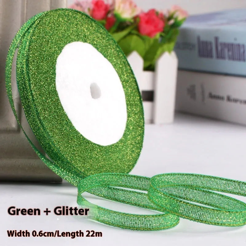Roll of polyester gift packaging ribbon with 0.6cm width and 22 metre length in various colour options
