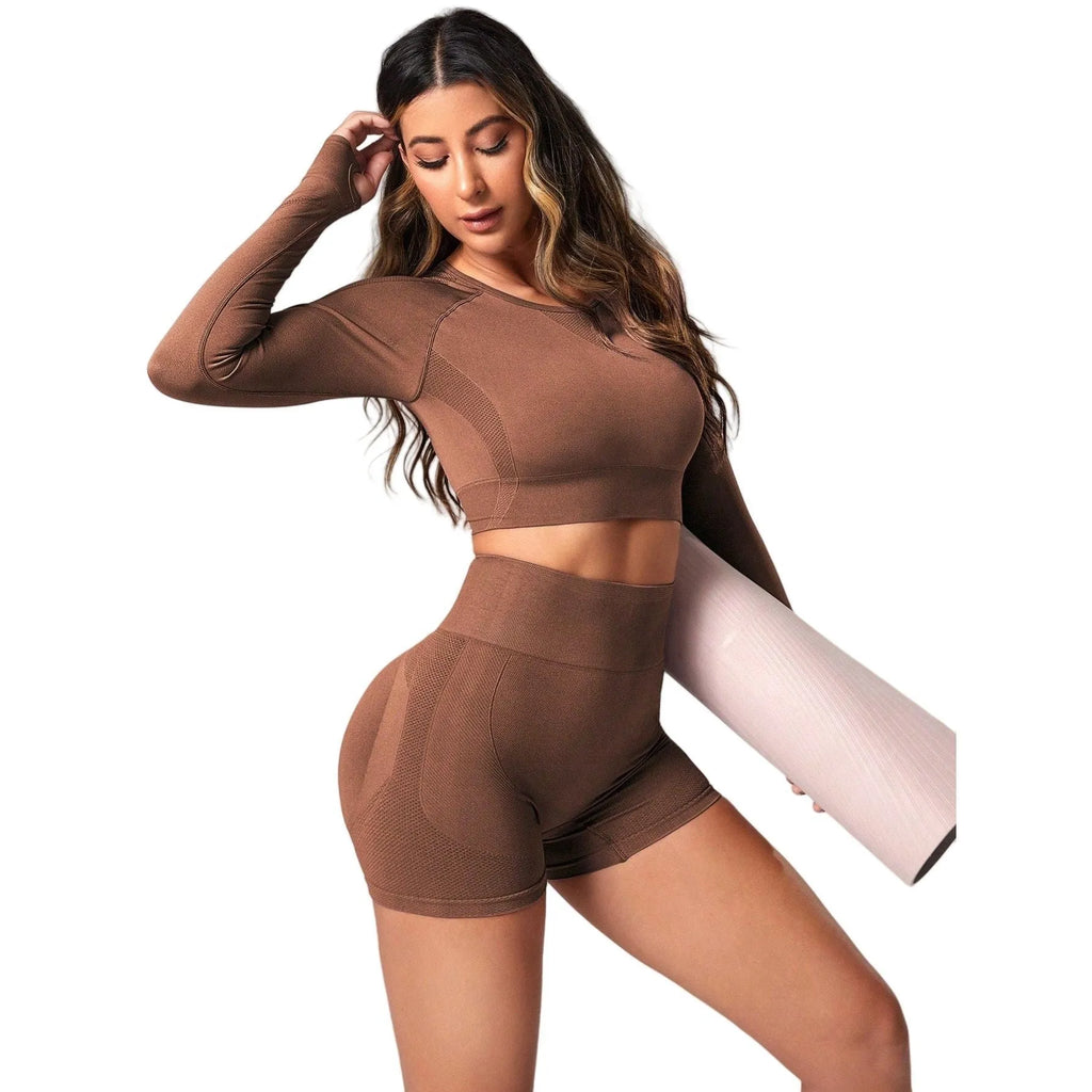 Women's black yoga suit with high waist and long sleeves for yoga practice
