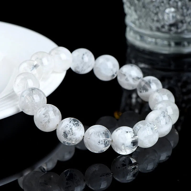 Natural crystal women's bracelet with blizzard snowflake round beads and geometric design featuring Ruyi Xiangyun elements