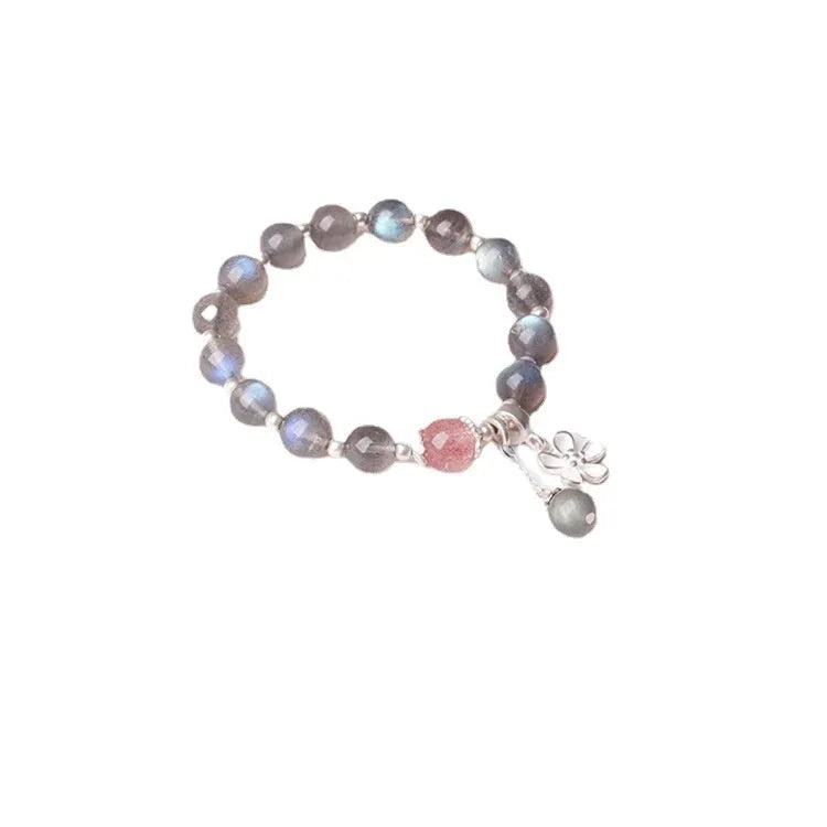 Women's crystal bracelet with 7.5mm beads and silver honeysuckle charm