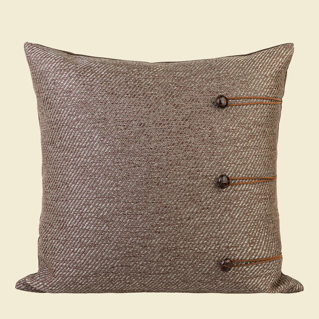 Chinese style square cushion with Maillard colour geometric patterns on living room sofa