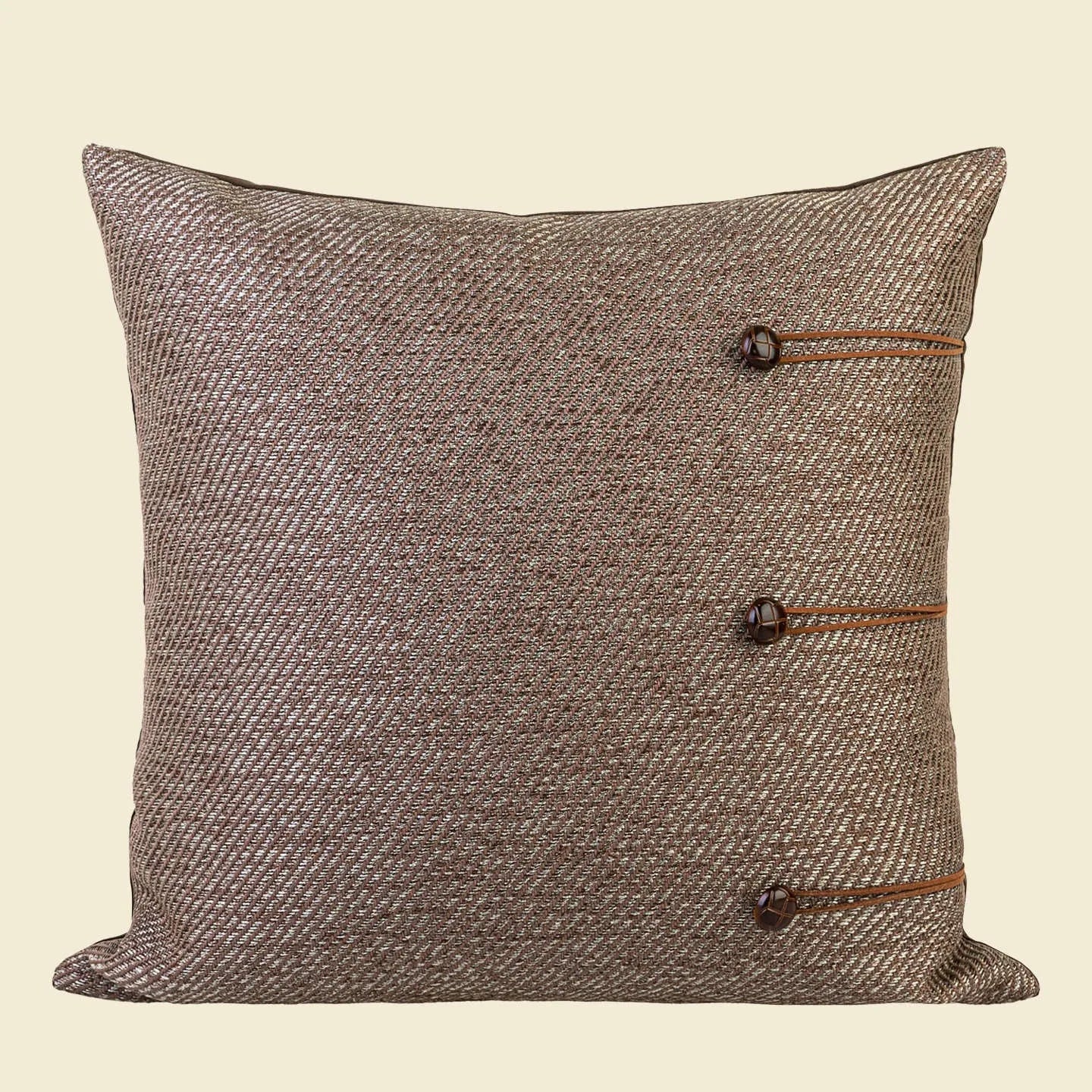 Chinese style square cushion with Maillard colour geometric patterns on living room sofa