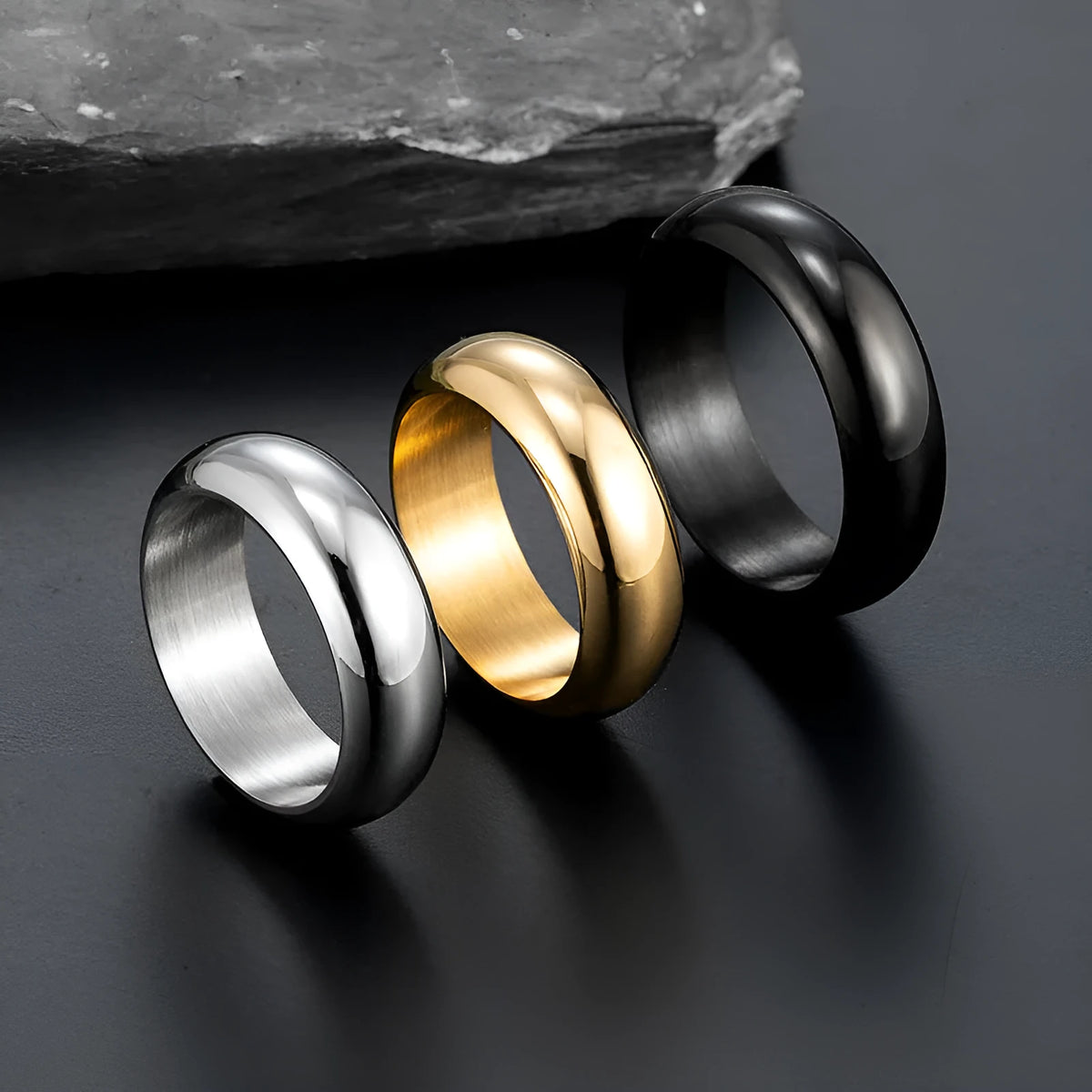 Glossy electroplated titanium steel ring in gold, black, and steel colour options