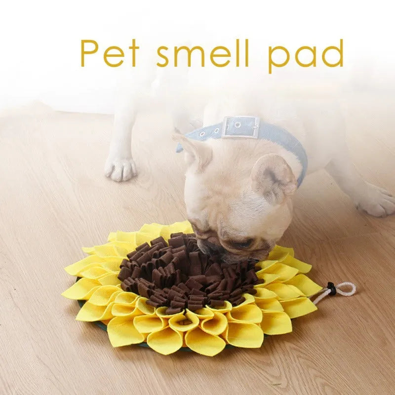 Yellow sunflower-shaped dog snuffle mat with fleece petals for treat hiding and slow feeding