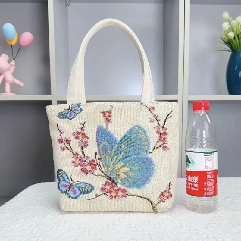 Double-sided gold wire embroidered canvas tote bag in botanical design with polyester construction