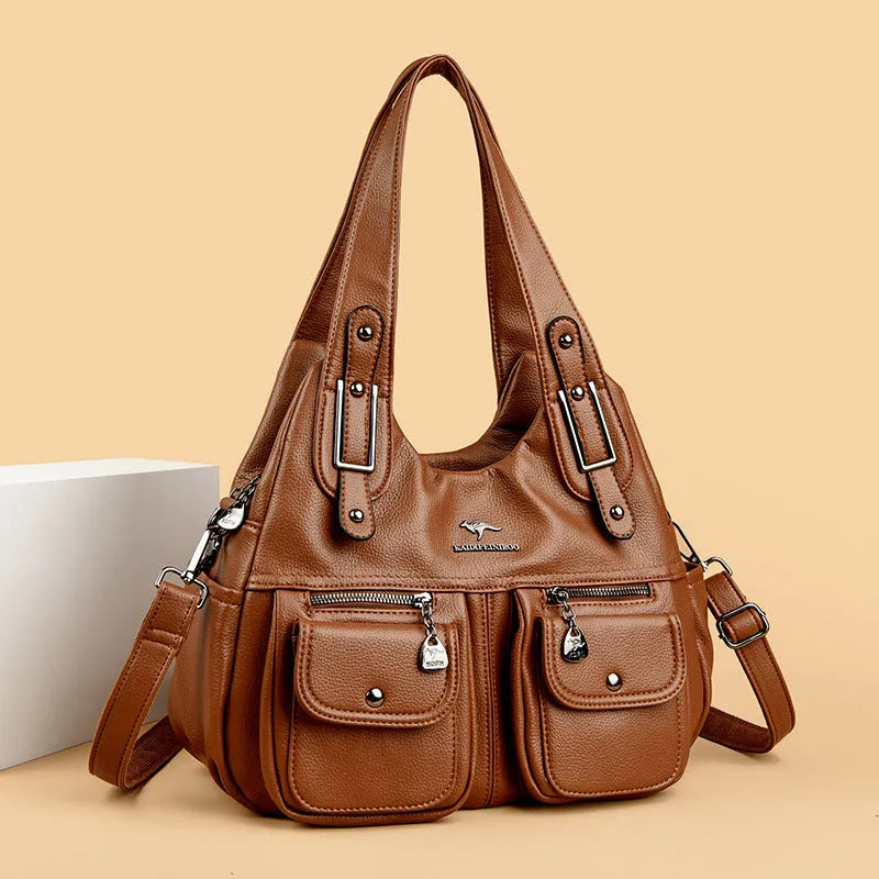 Heart-shaped crossbody handbag in soft PU with slit pocket and six colour options