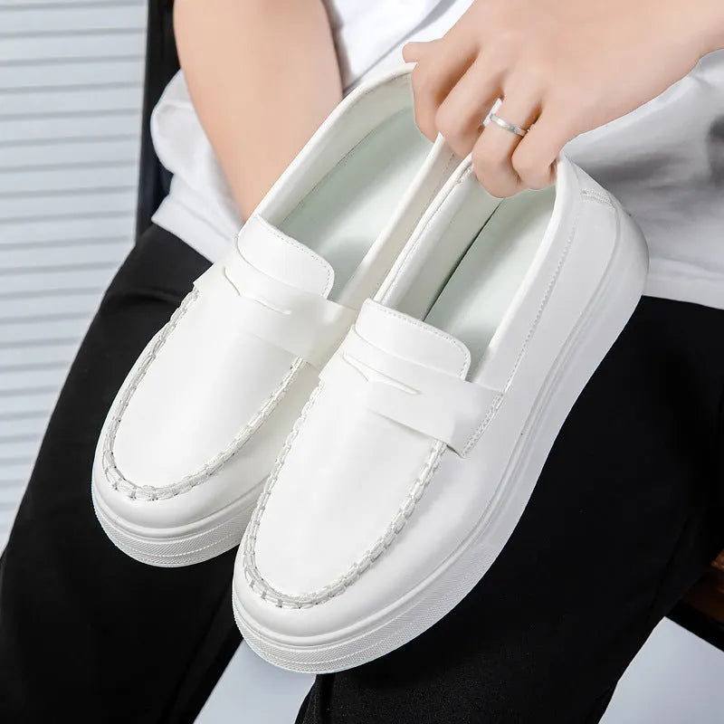 PU artificial leather slip-on casual shoes in white, shown in a side view on a neutral background.