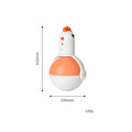 Green and orange electric cat toy chicken shape with laser light and motion features on a floor.
