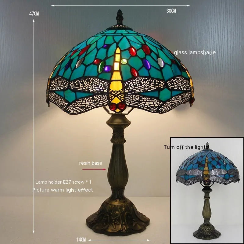 Stone table lamp with Tiffany-style blue dragonfly design on base