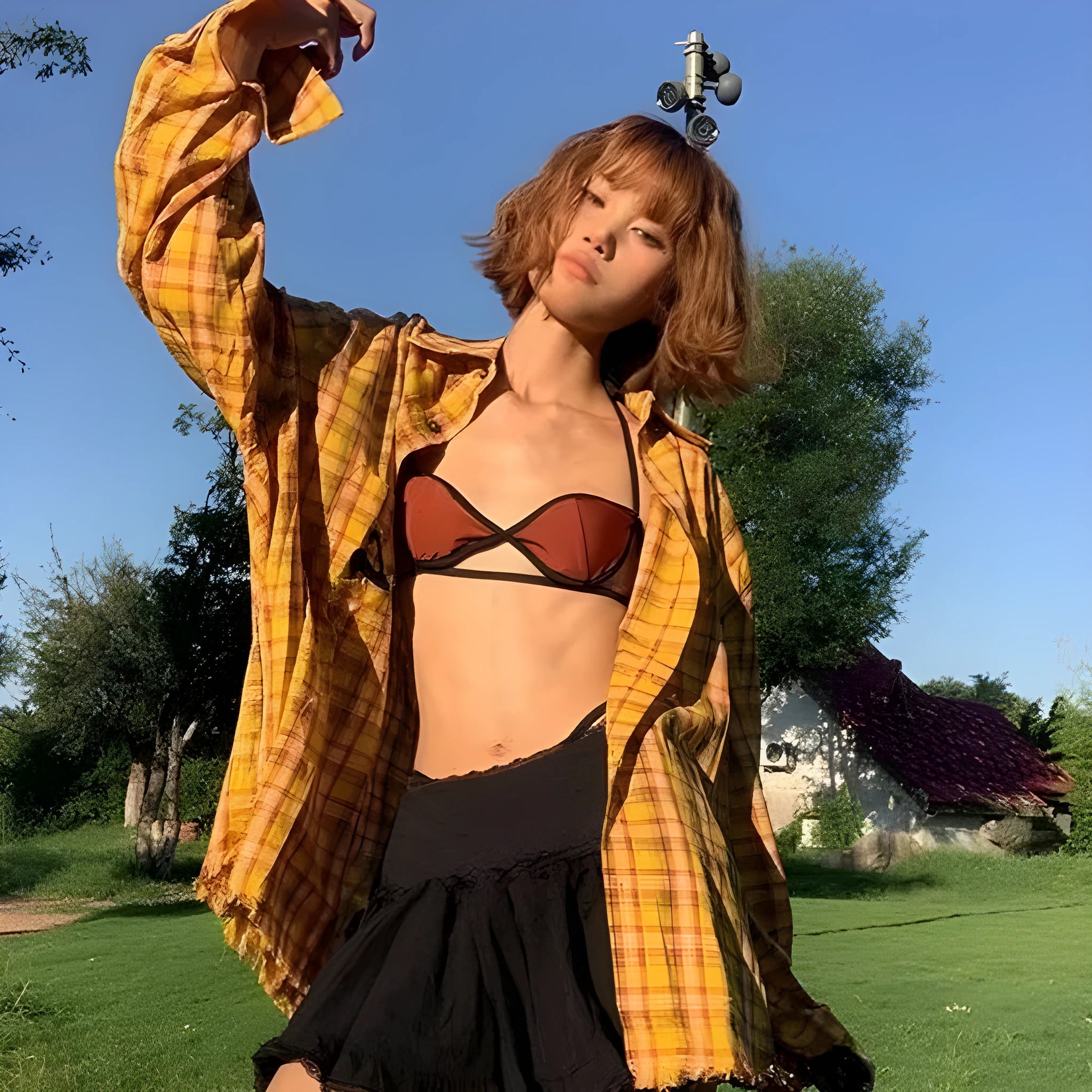 Dopamine yellow plaid shirt with loose cardigan fit on a hanger.