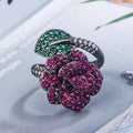 Geometric women's ring with red corundum stone and black gold finish