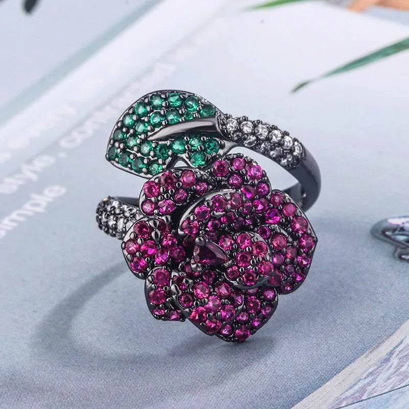 Geometric women's ring with red corundum stone and black gold finish