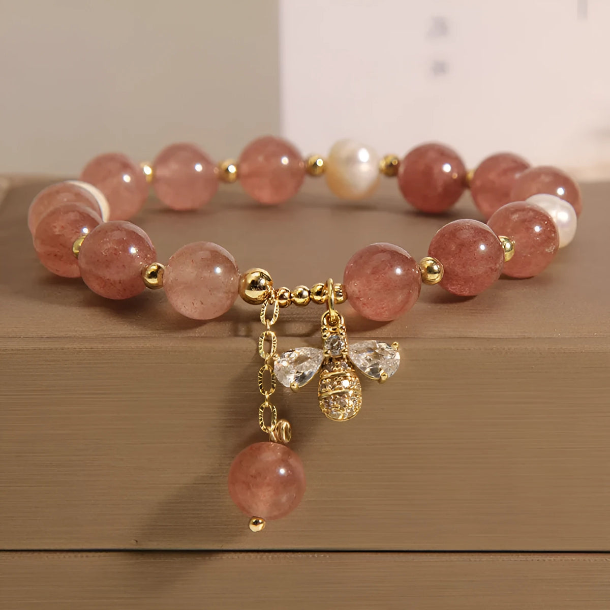 Women's strawberry quartz and freshwater pearl bracelet with zircon details and alloy clasp