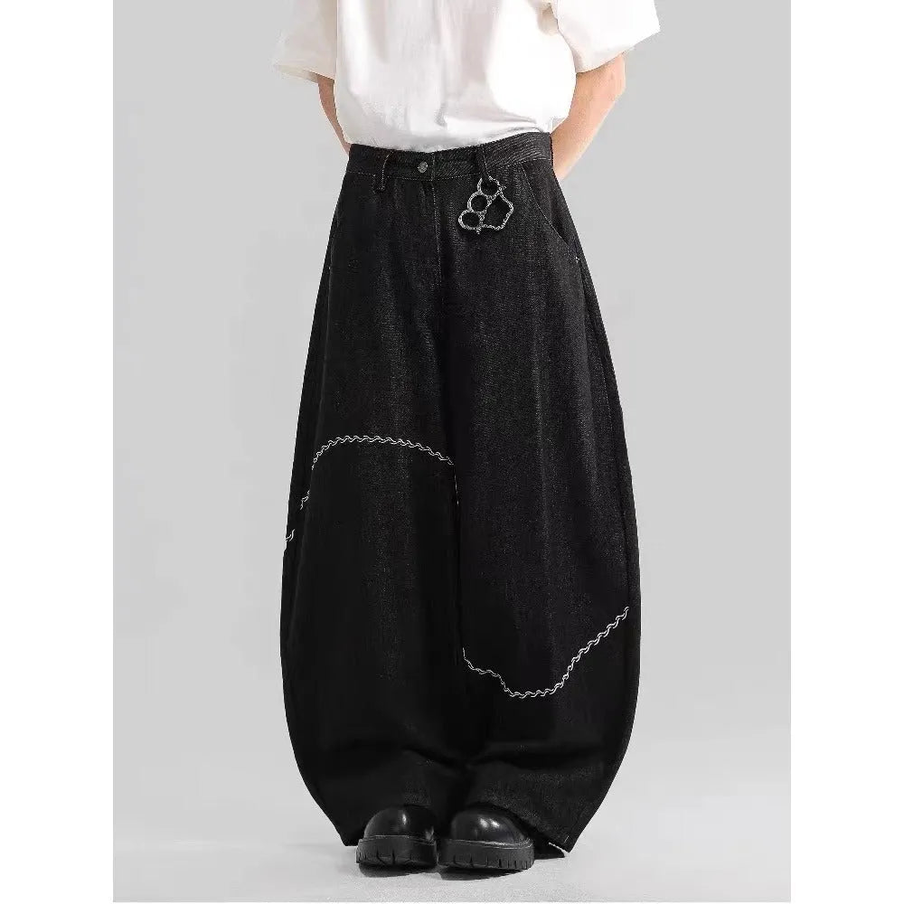 Black straight-leg denim trousers with mid waist and zip fly on mannequin