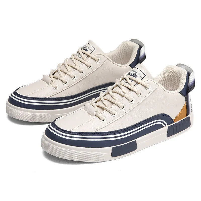 Men's white and green canvas casual shoes with visible mesh panel sections on a flat heel.