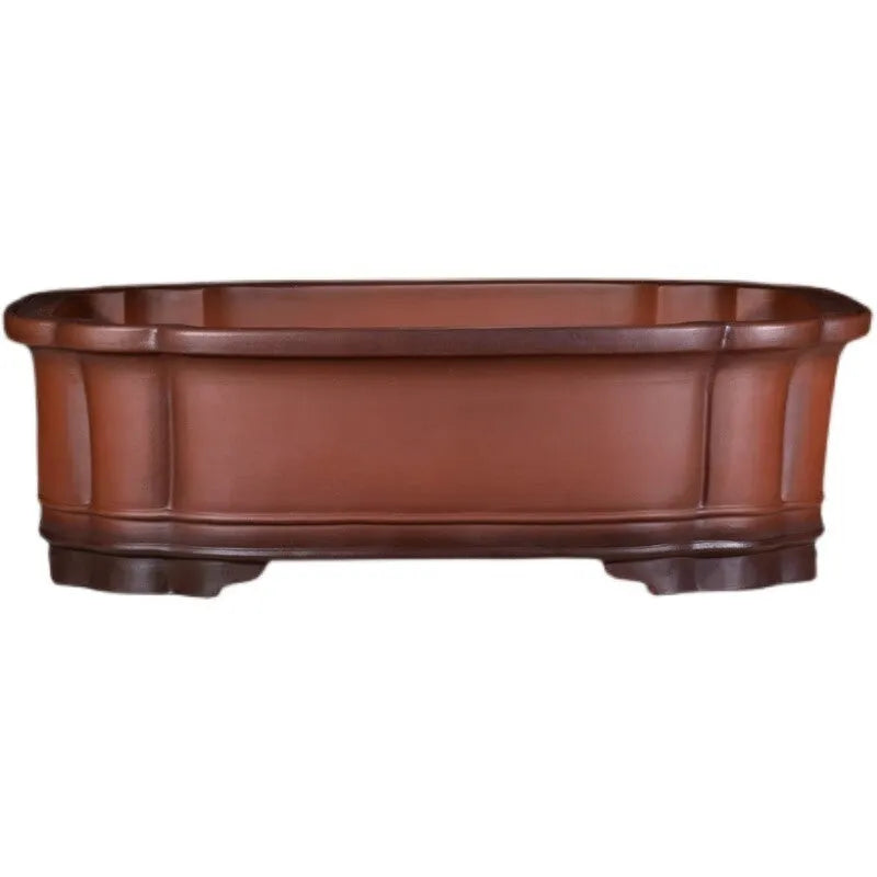 Large antique-look purple clay flowerpot with Chinese tree stump and floral patterns.
