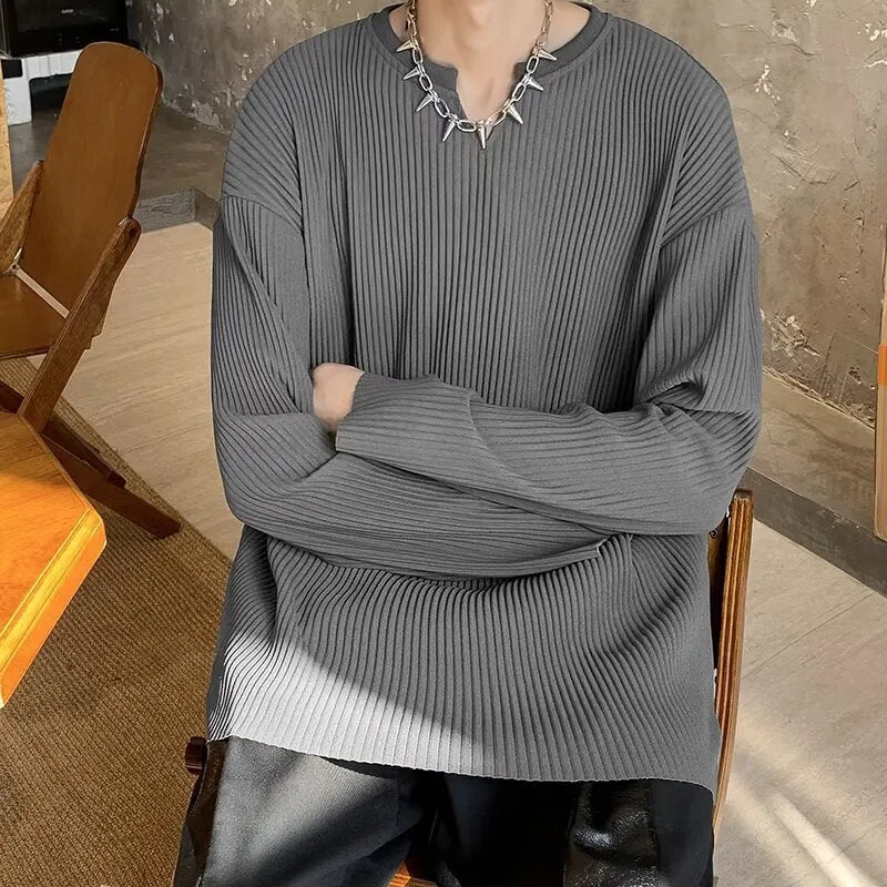 Plus size women's striped texture pullover top in loose fit with long sleeves
