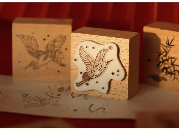 Mr Paper wooden seal set showing handcrafted stamp with crane design for DIY printing projects