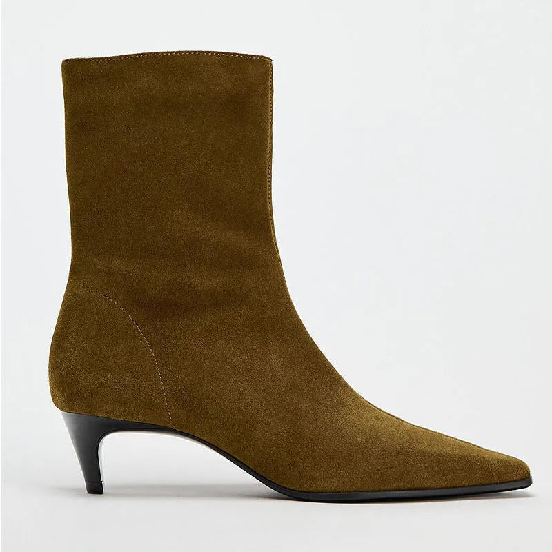 Brown square toe ankle boots with side zip and a mid stiletto heel on a waterproof platform sole.