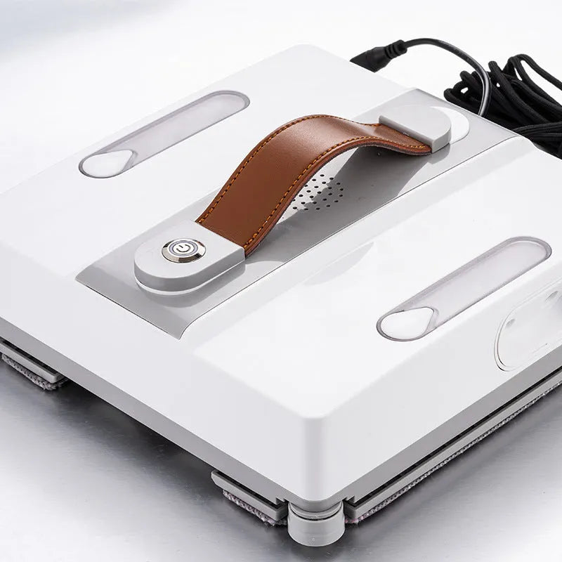 White electric window cleaning robot with four water spray jets for automated high-rise window washing