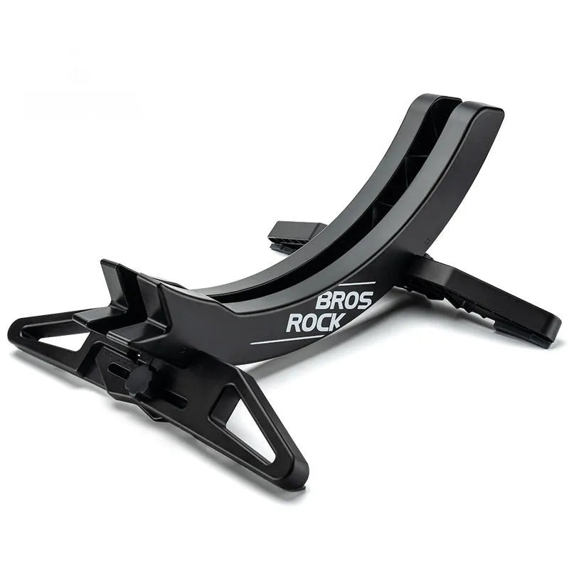 Black and green ABS plastic bicycle parking rack holder mounted on a wall.