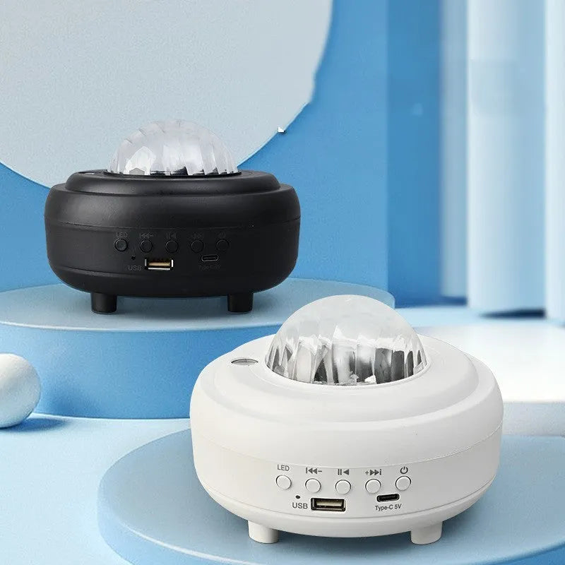 White Galaxy Star Projector night light projecting blue star patterns on ceiling