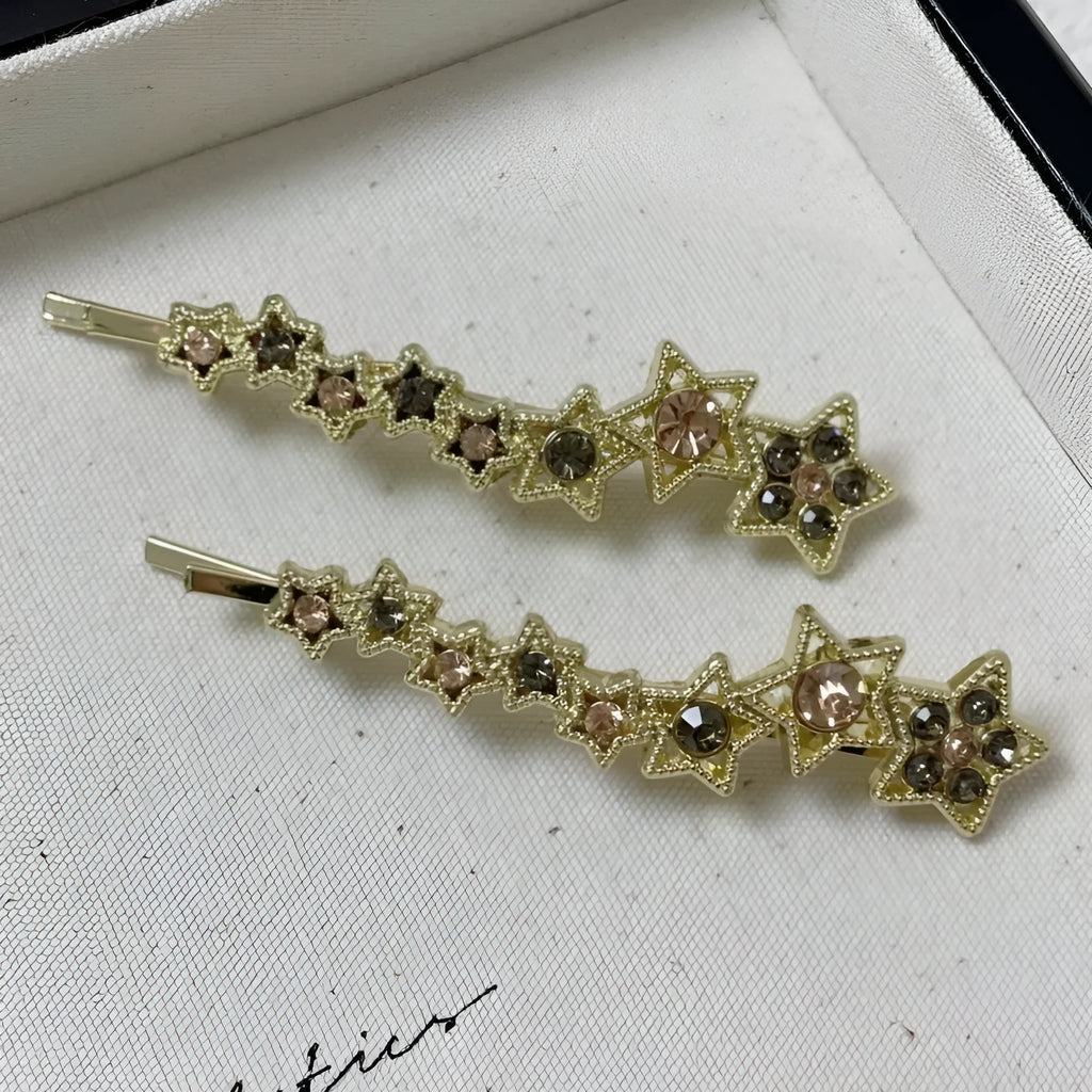 Gold electroplated rhinestone barrette with star design hair clip