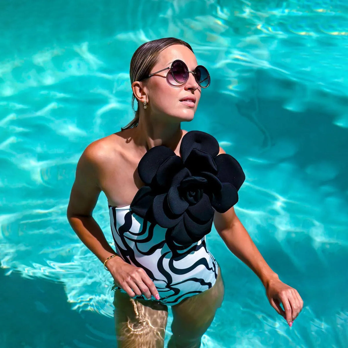 Women's one-piece swimsuit with 3D flower pattern in US sizes S, M, L, XL.