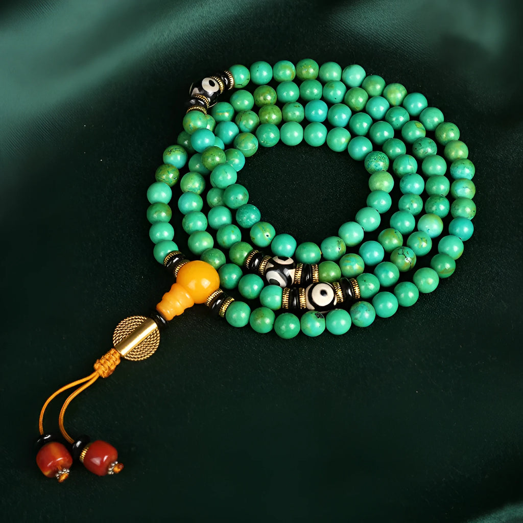 Natural turquoise gemstone bracelet with 108 round 8mm polished beads.