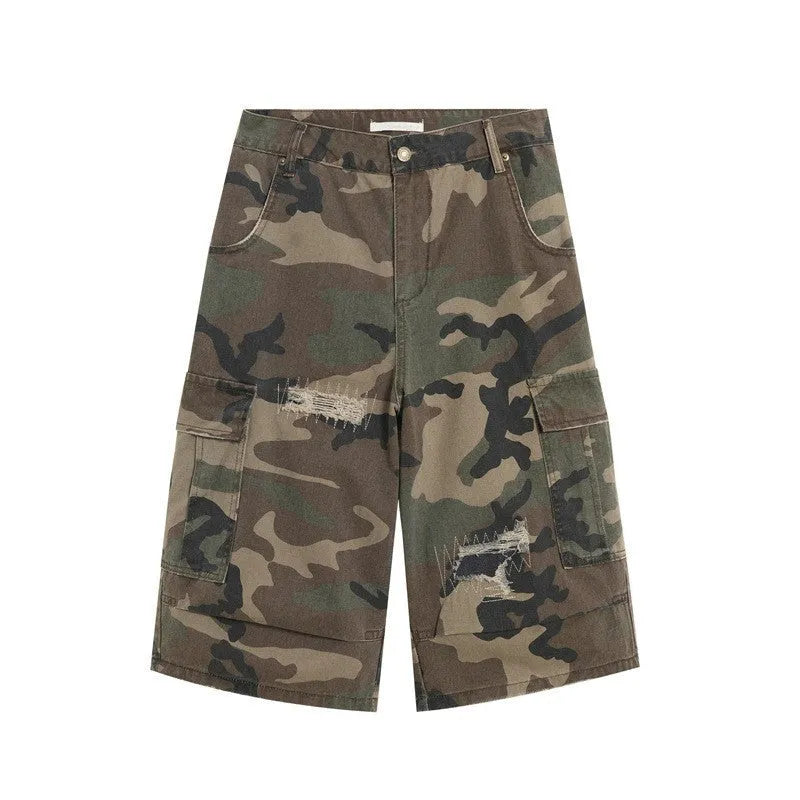 Men's camouflage cropped jeans with patchwork and ripped detailing in straight-leg loose fit