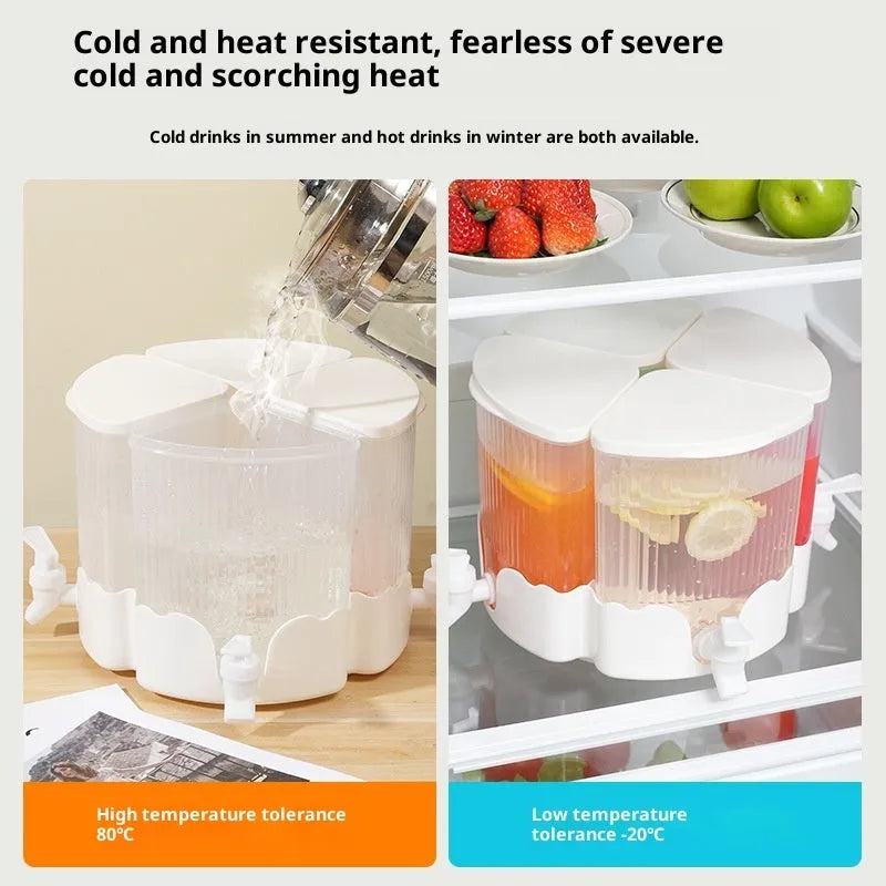 Rotating refrigerator water jug with faucet and four compartments in glacier pattern for cold drinks.