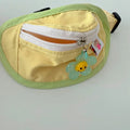 Messenger style dog backpack in powder blue with adjustable sizing for pet transport