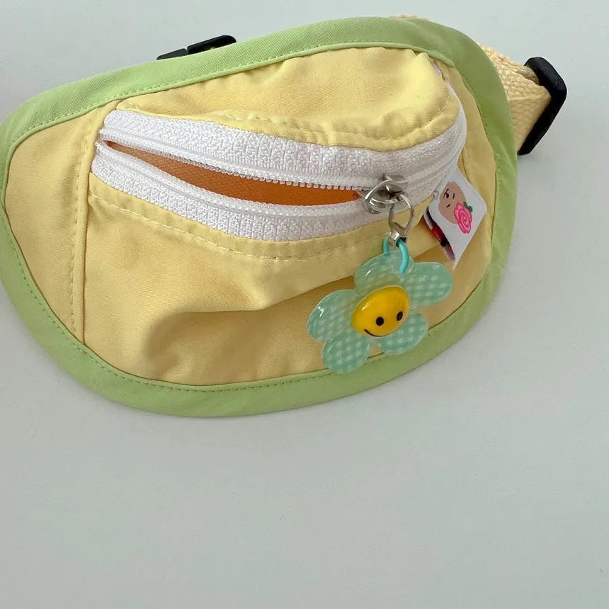 Messenger style dog backpack in powder blue with adjustable sizing for pet transport