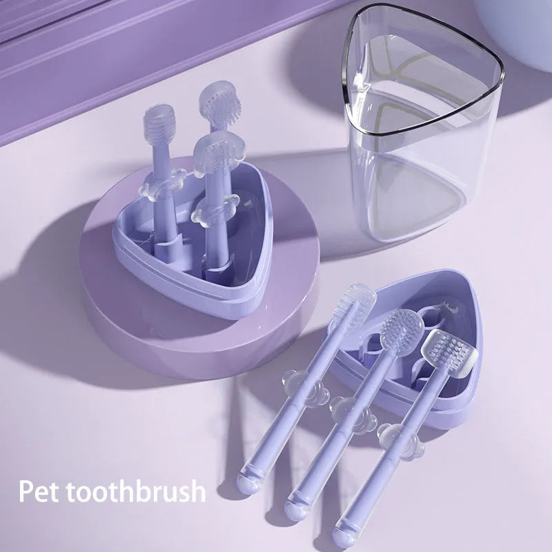 Soft silicone finger toothbrush for dog and cat dental care in purple, blue and green colours.