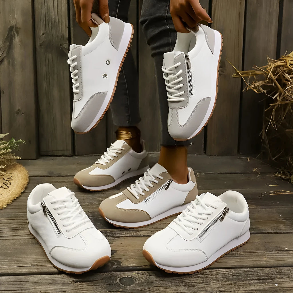 Women's flat-heeled shoes in artificial PU, available in Champagne, Gray, and White colour options.