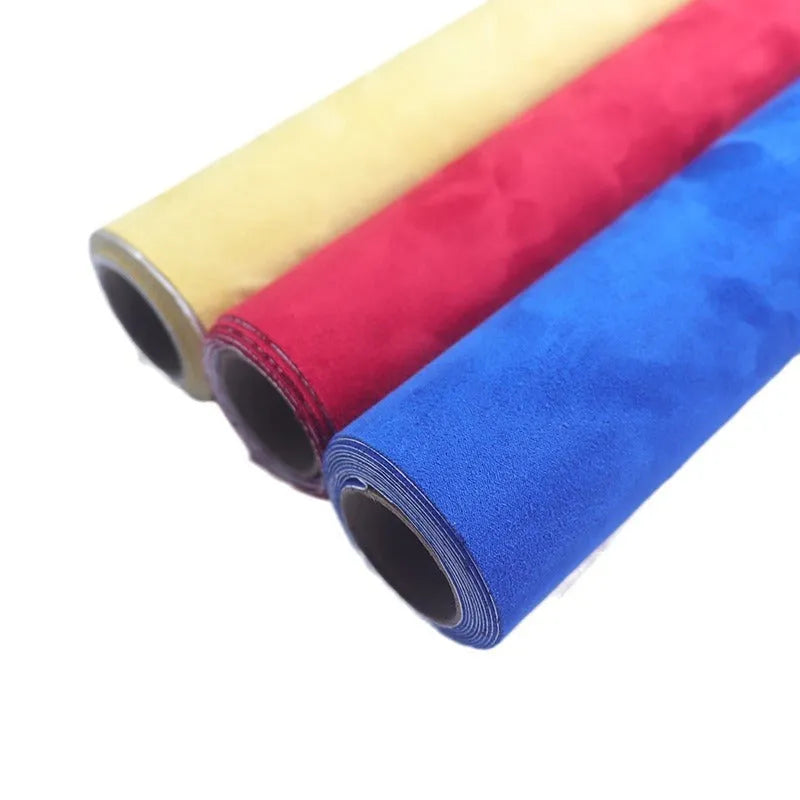 Roll of self-adhesive leather suede in beige colour showing texture and adhesive backing.