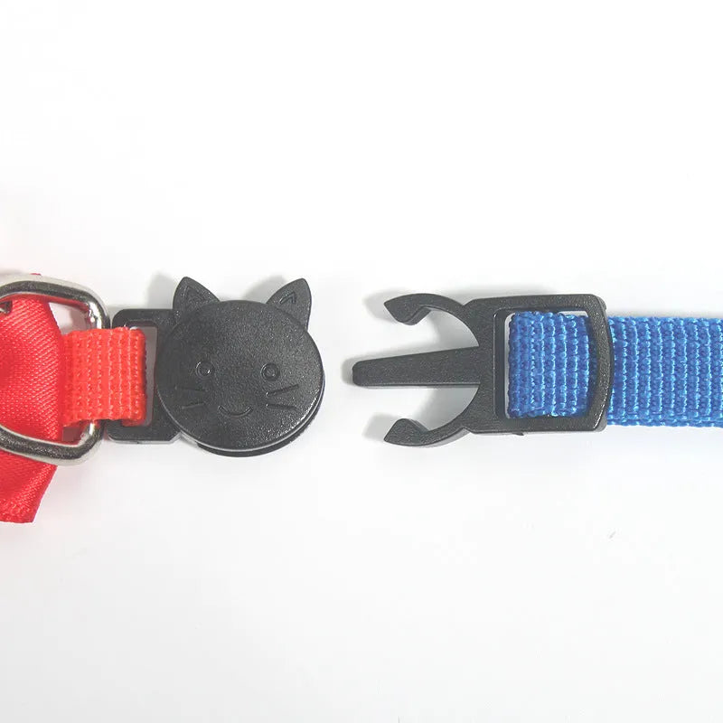 Adjustable nylon cat collar with decorative bow and bell in multiple colour options