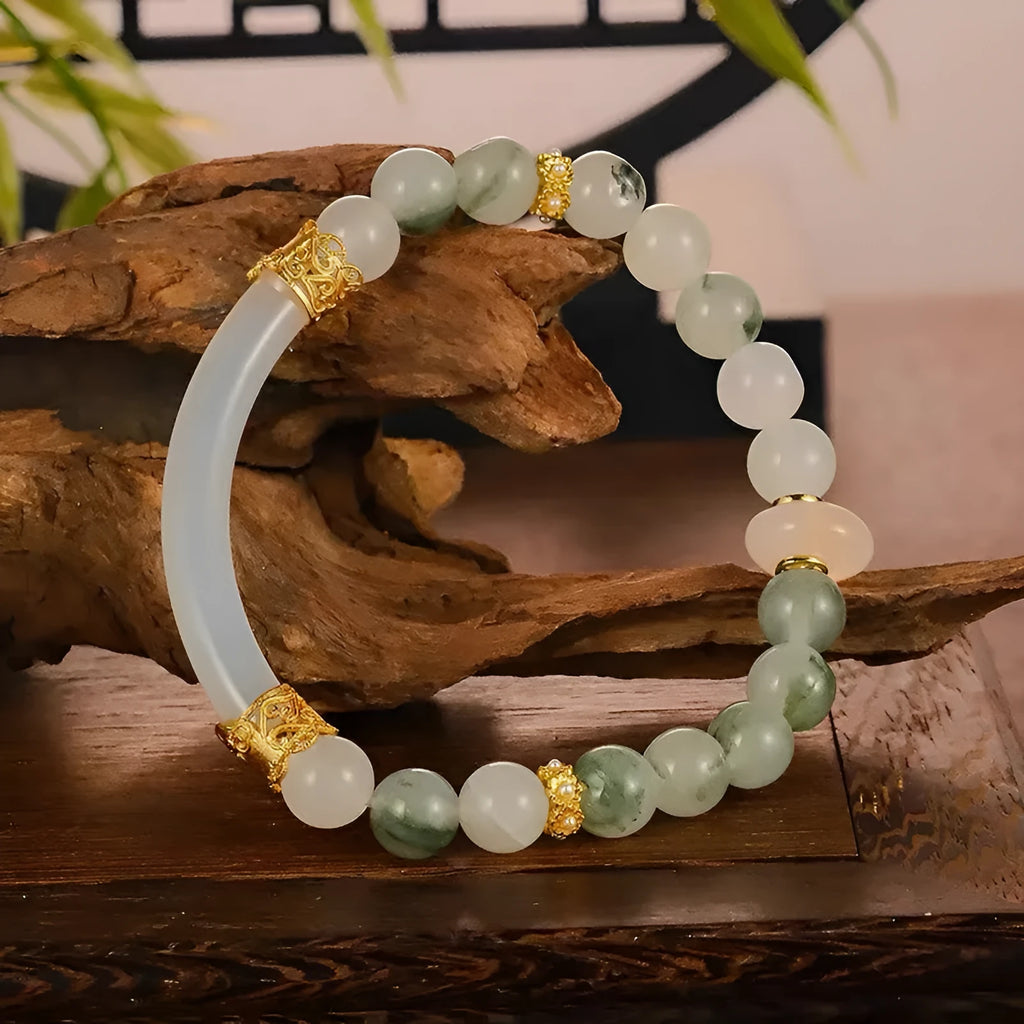 Light green Tian Shan Cui jade women's half bracelet with floating flower girl design in Chinese folk style.