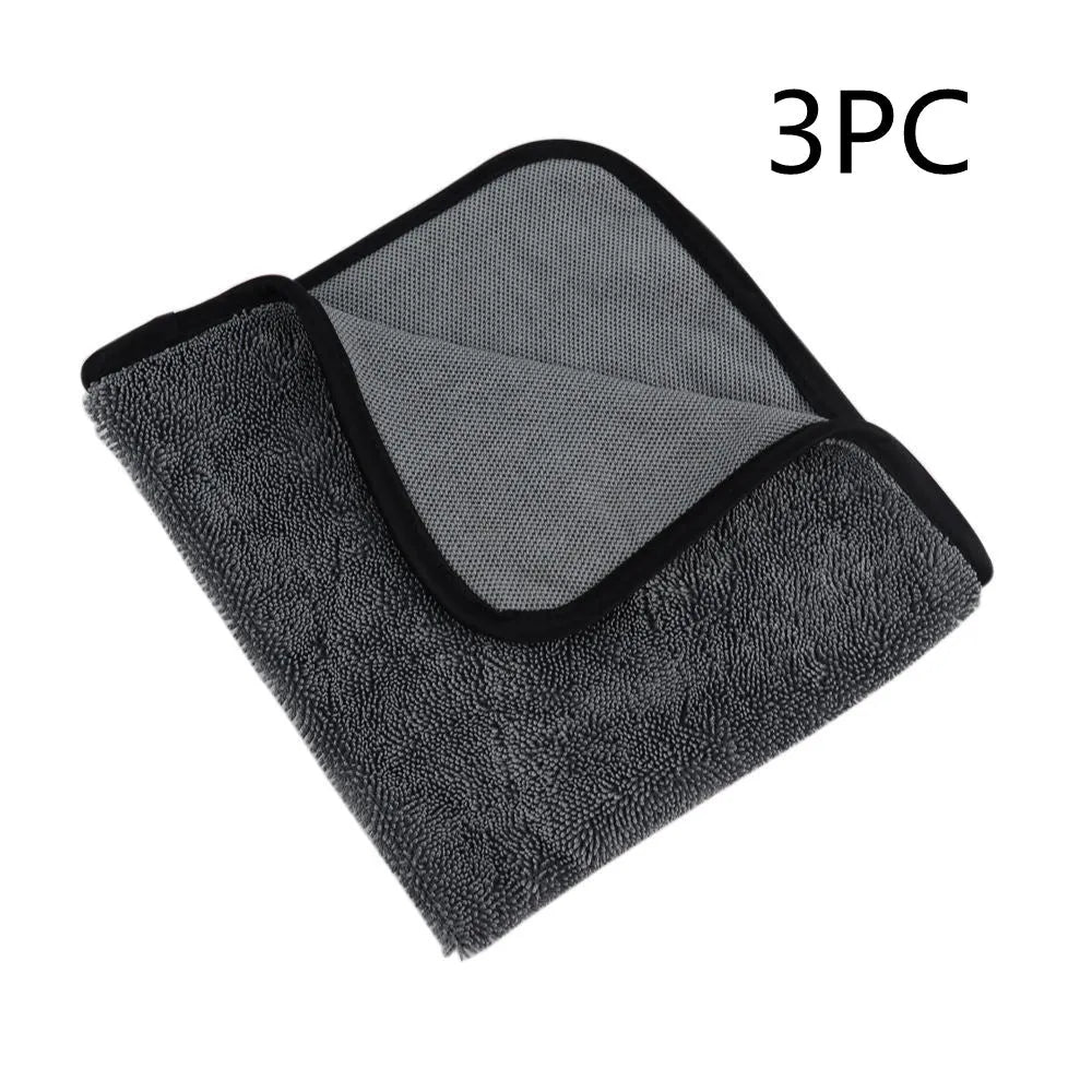 Grey 40x40 centimetre microfiber car wash and drying towel laid flat