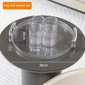 Rotating refrigerator water jug with faucet and four compartments in glacier pattern for cold drinks.